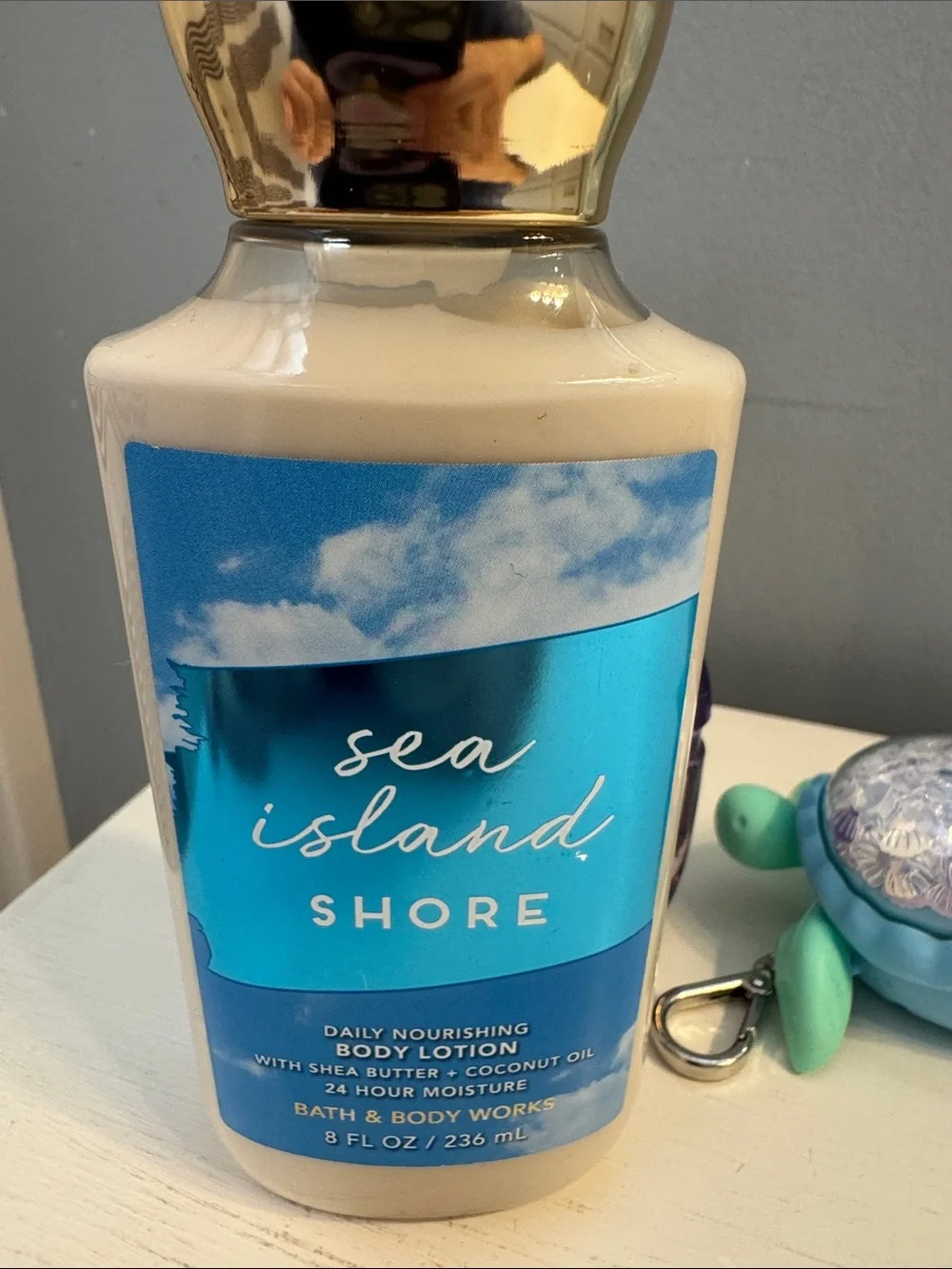 Bath & Body Works Sea Island Shore Body Lotion, Rapunzel hand sanitizer & holder